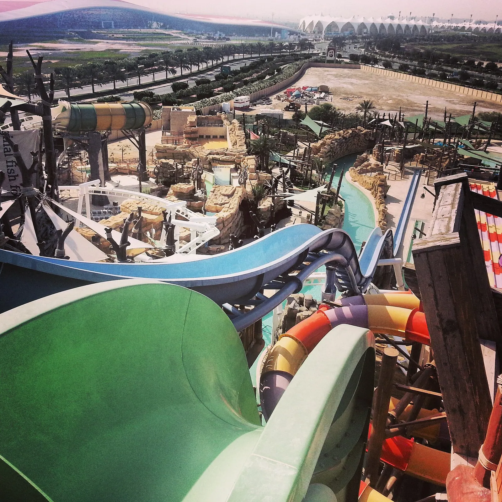 Waterslide plunging into a turquoise pool